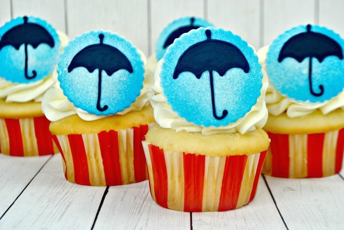 cupcakes topped with umbrellas