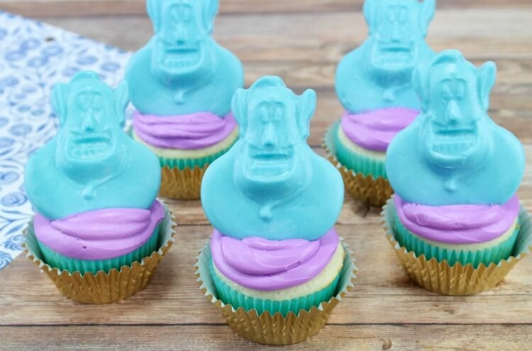 blue and purple cupcakes with Aladdin toppers