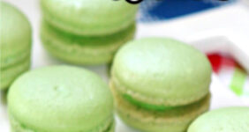 Key lime macarons on a white plate for Pinterest.