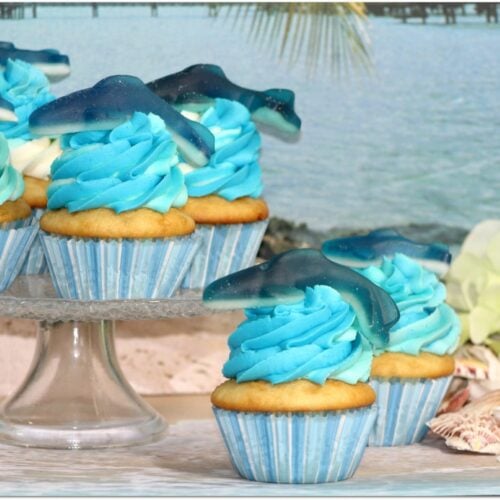 This Shark Week Cupcake dessert recipe is pretty popular right now with the event right around the corner. Did you know Shark Week is the most watched show in the 26-year history of the Discovery Channel? Make this easy dessert and surprise the kids with a special treat! Also great for summer pool parties and birthdays!