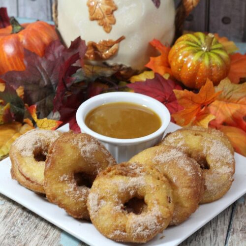 This homemade apple rings recipe will be the hit of your fall party or school event! Apples are such a popular food in the fall, but we love them all year long! You will want to add this to your list of favorite recipes!