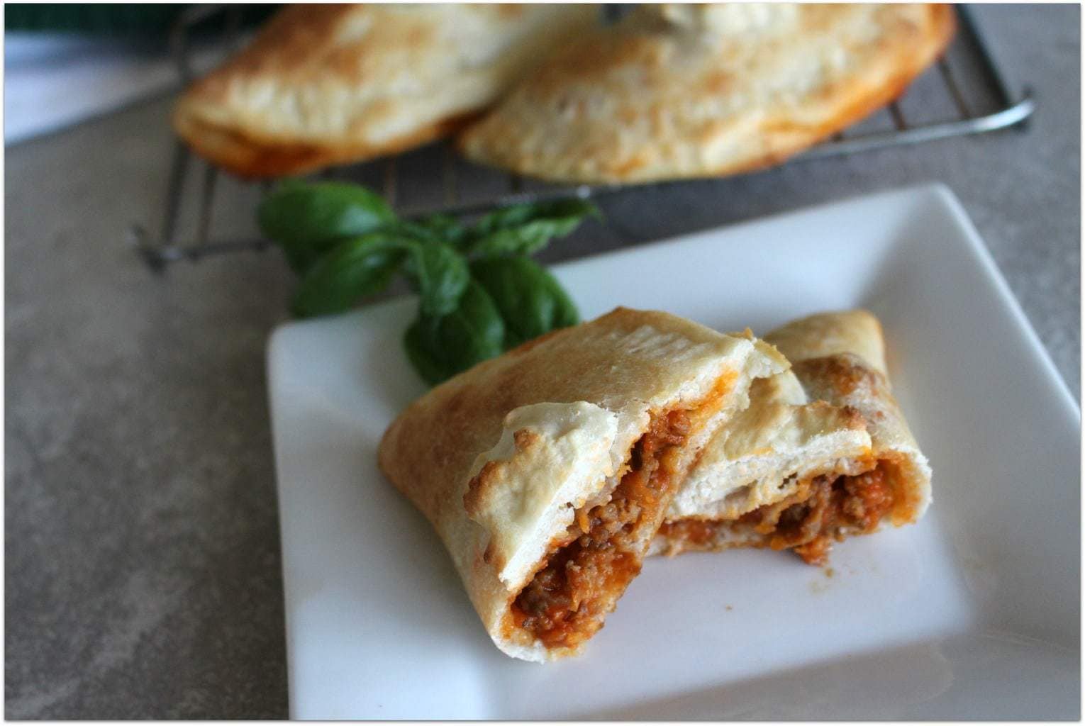 This Mini sausage calzone recipe is so easy, and my kids raved over how delicious they were! These would make a great lunch, dinner, and perfect appetizers for a party. I love easy recipes! 