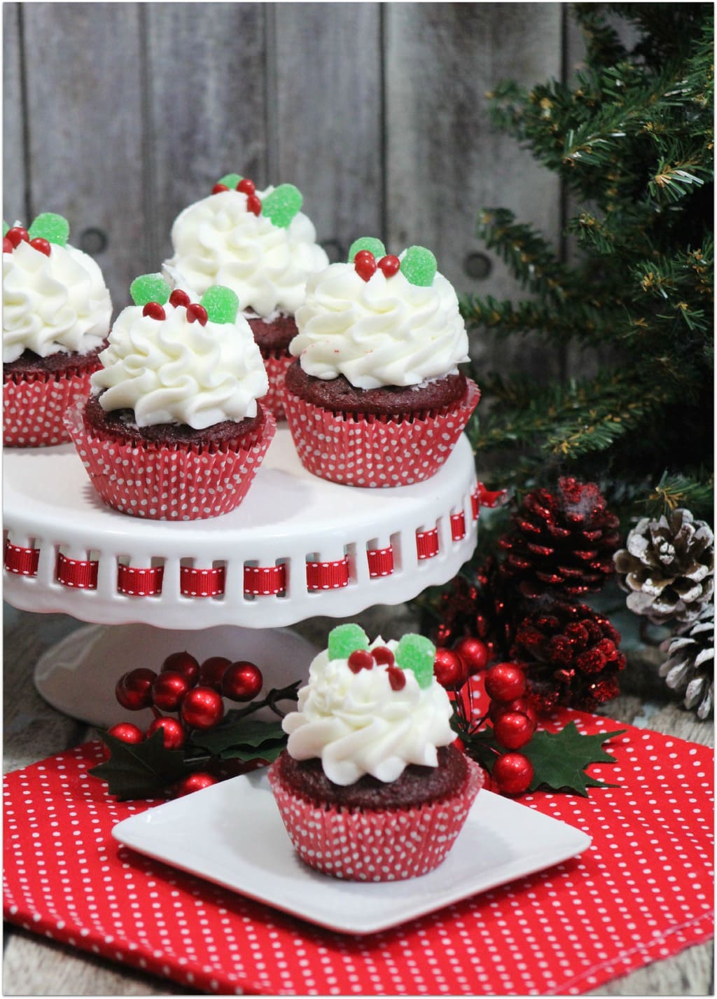 These Holly Red Velvet Cupcakes are so festive, and the perfect dessert to take to a Christmas party! The recipe is easy, so you won't spend hours in the kitchen. You're welcome! This will end up being your go-to holiday dessert recipe!
