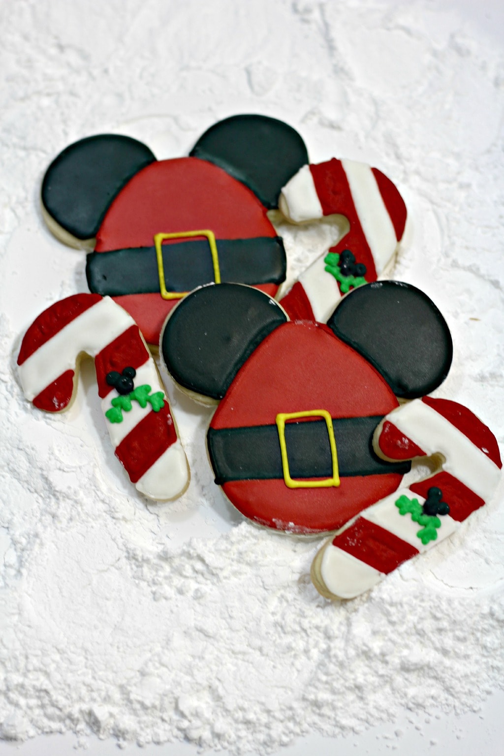 Cookies decorated like Santa Mickey Mouse