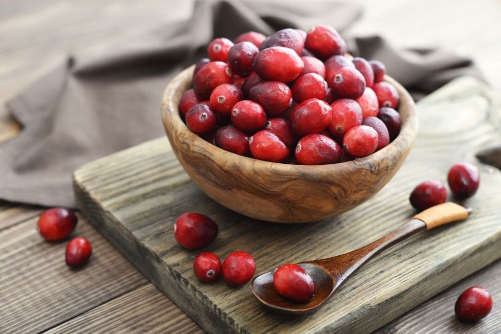 cranberries in a wooden bowl
