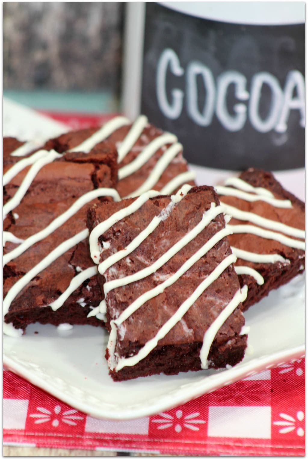 These Red Velvet Brownies are so easy to make and the flavor will knock your socks off! Chocolate and cream cheese go so well together, and you'll be out of the kitchen in no time! 