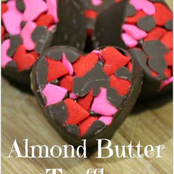 These Almond Butter Truffles are the perfect treat for Valentine’s Day - or any day you want to say I love you! It's such an easy recipe, and the heart truffles turn out so pretty. Head to the kitchen with the kids and let them help! When asked to bring food to that Valentine’s Day party, this is a wonderful dessert and will stand out among all those cookies and cupcakes!