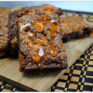 Everyone loves brownies, and these Butterfinger Brownies are the bomb! This dessert will be a hit at any party, and it's such an easy recipe! Using Ghirardelli dark baking chocolate and caramel chips along with Butterfinger bits takes this recipes to a whole new level. This will be your go-to dessert from now on!