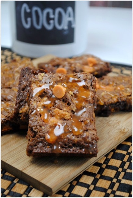 Everyone loves brownies, and these Butterfinger Brownies are the bomb! This dessert will be a hit at any party, and it's such an easy recipe! Using Ghirardelli dark baking chocolate and caramel chips along with Butterfinger bits takes this recipes to a whole new level. This will be your go-to dessert from now on!