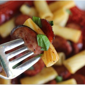 This Italian Rigatoni with smoked sausage and sundried tomato is one of the best dinner recipes I've ever made. The smokiness of the sausage paired with the sweetness of the sundried tomatoes gives this easy recipe amazing flavor, and it won't keep you in the kitchen for hours! I like easy!