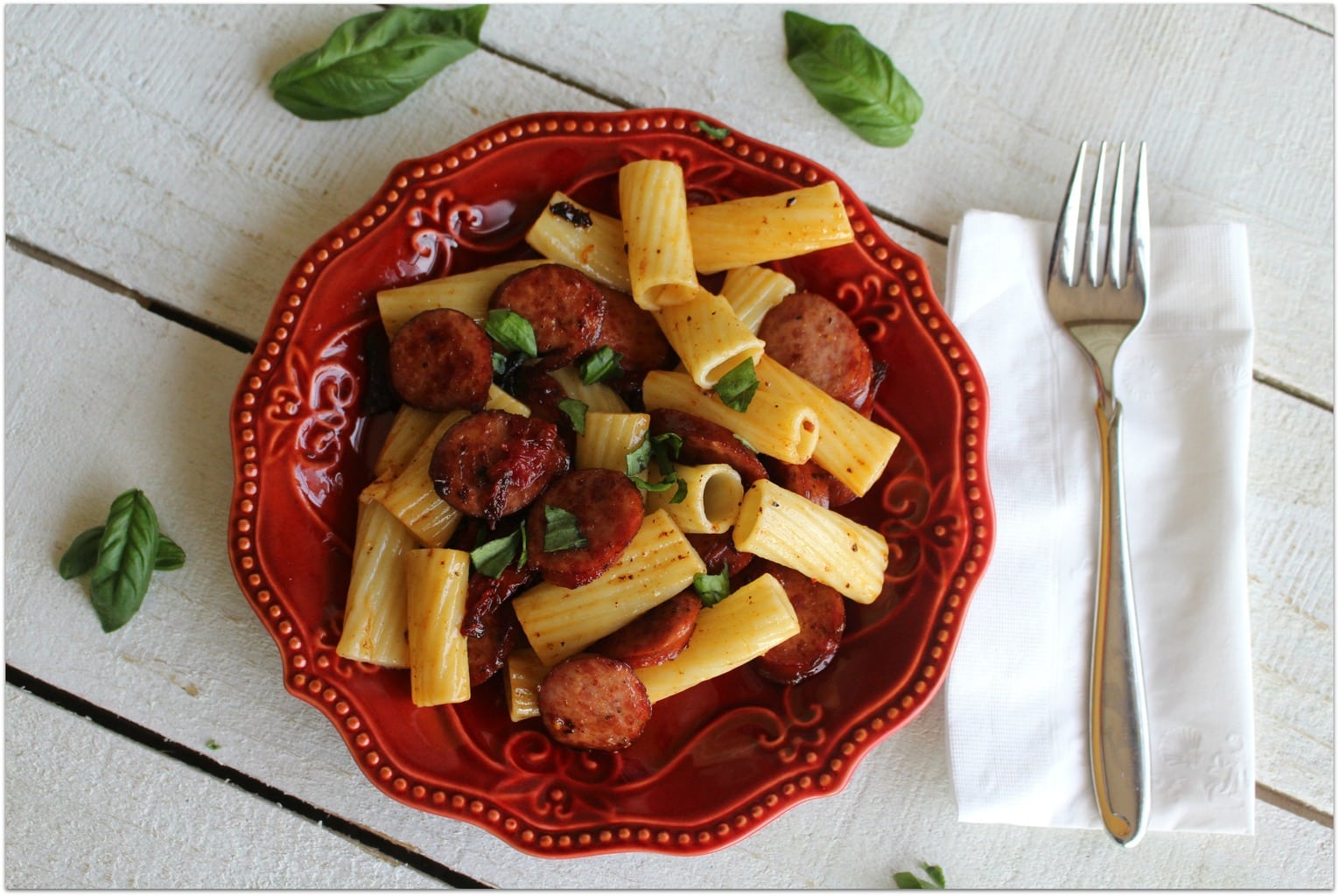 This Italian Rigatoni with smoked sausage and sundried tomato is one of the best dinner recipes I've ever made. The smokiness of the sausage paired with the sweetness of the sundried tomatoes gives this easy recipe amazing flavor, and it won't keep you in the kitchen for hours! I like easy!