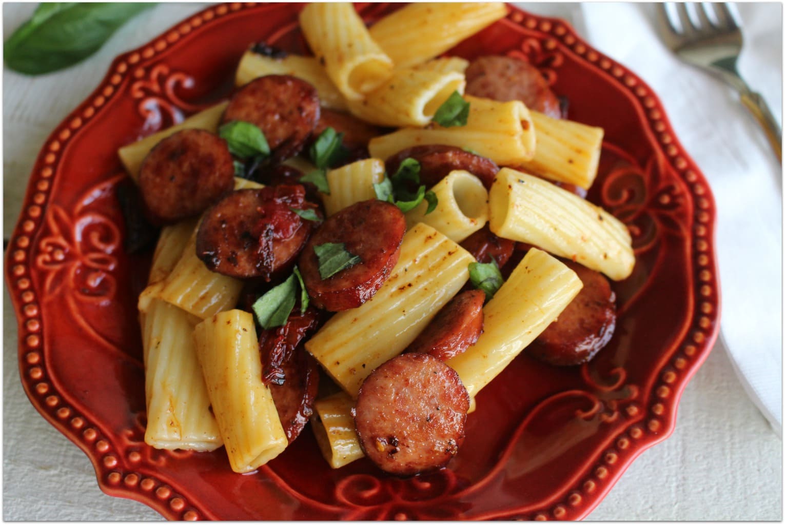 This Italian Rigatoni with smoked sausage and sundried tomato is one of the best dinner recipes I've ever made. The smokiness of the sausage paired with the sweetness of the sundried tomatoes gives this easy recipe amazing flavor, and it won't keep you in the kitchen for hours! I like easy!