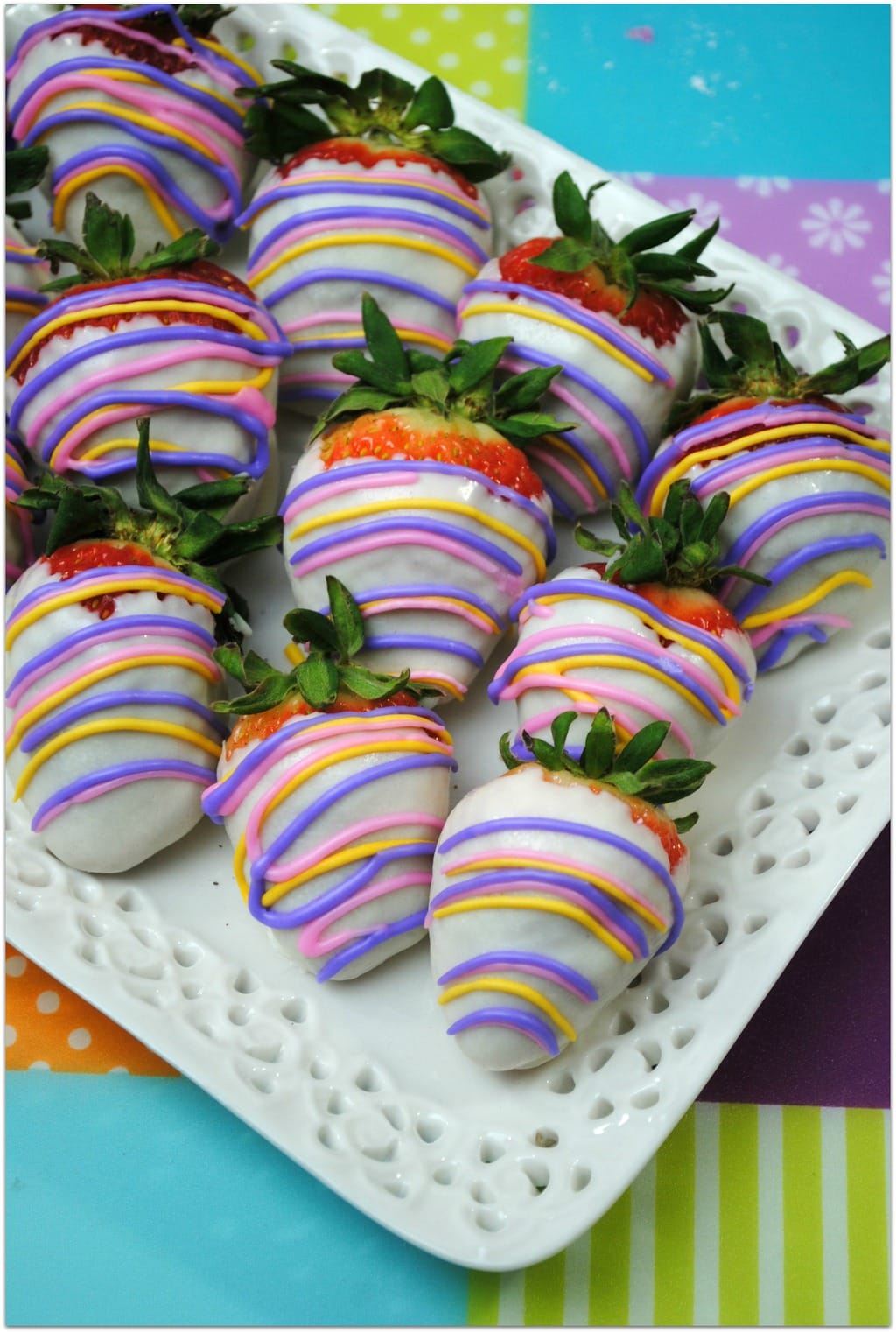 chocolate covered strawberries on a white plate