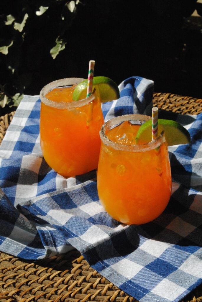 This refreshing Mango Margarita is the perfect drink to enjoy with friends. Festive enough for an elegant evening gathering, but easy enough for a drink by the pool, this cocktail will be your new favorite. All you need is a little food like chips and salsa and a few appetizers, good music, and you've got a summer party in the making!