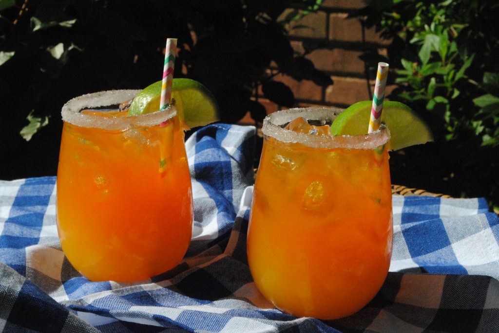 This refreshing Mango Margarita is the perfect drink to enjoy with friends. Festive enough for an elegant evening gathering, but easy enough for a drink by the pool, this cocktail will be your new favorite. All you need is a little food like chips and salsa and a few appetizers, good music, and you've got a summer party in the making!