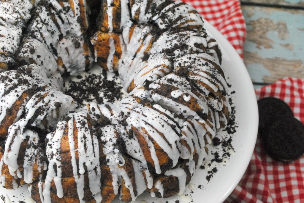 What could be better than Oreo Monkey Bread? The deliciousness of Monkey Bread paired with the yumminess of the classic favorite OREO cookie is the perfect dessert to bring to that family gathering or party with friends. This recipe is so easy! No one has to know how simple it is! Get the kids to join you in the kitchen for some cooking fun, and the result will have everyone smiling. 