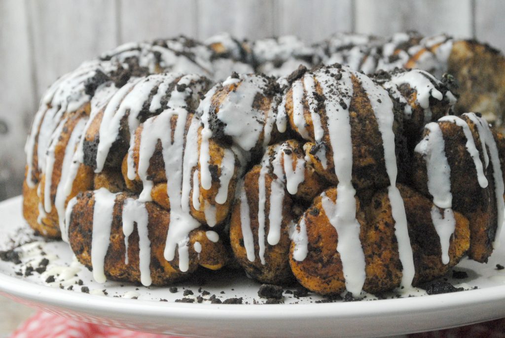 What could be better than Oreo Monkey Bread? The deliciousness of Monkey Bread paired with the yumminess of the classic favorite OREO cookie is the perfect dessert to bring to that family gathering or party with friends. This recipe is so easy! No one has to know how simple it is! Get the kids to join you in the kitchen for some cooking fun, and the result will have everyone smiling. 