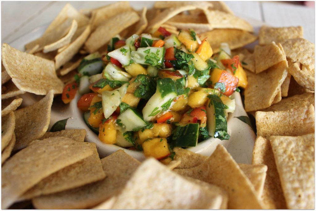 What could be better at a cookout or party than fresh peach and cucumber salsa? It doesn't matter what's on the table, I gravitate towards the chips and salsa. Any kind of salsa will do!