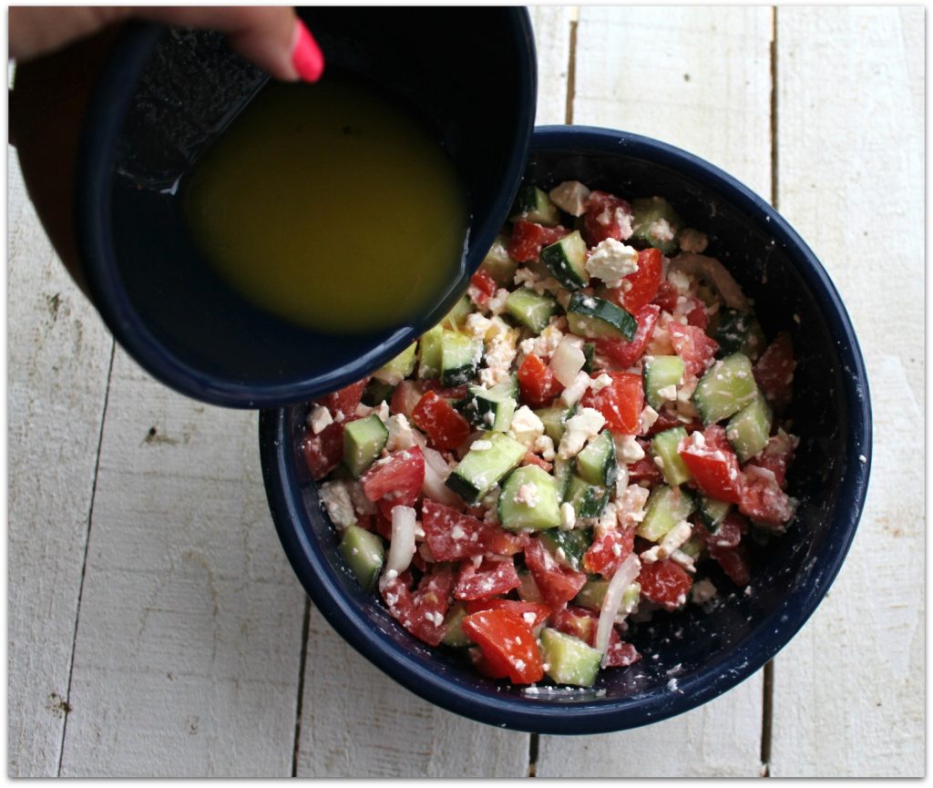 This salad is fantastic in the summer when tomatoes are perfect, but with produce coming in from all over the world all the time, you can easily find cucumbers and tomatoes year-round. They key to this salad is, of course, the dressing.