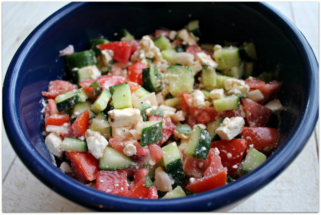 This salad is fantastic in the summer when tomatoes are perfect, but with produce coming in from all over the world all the time, you can easily find cucumbers and tomatoes year-round. They key to this salad is, of course, the dressing.