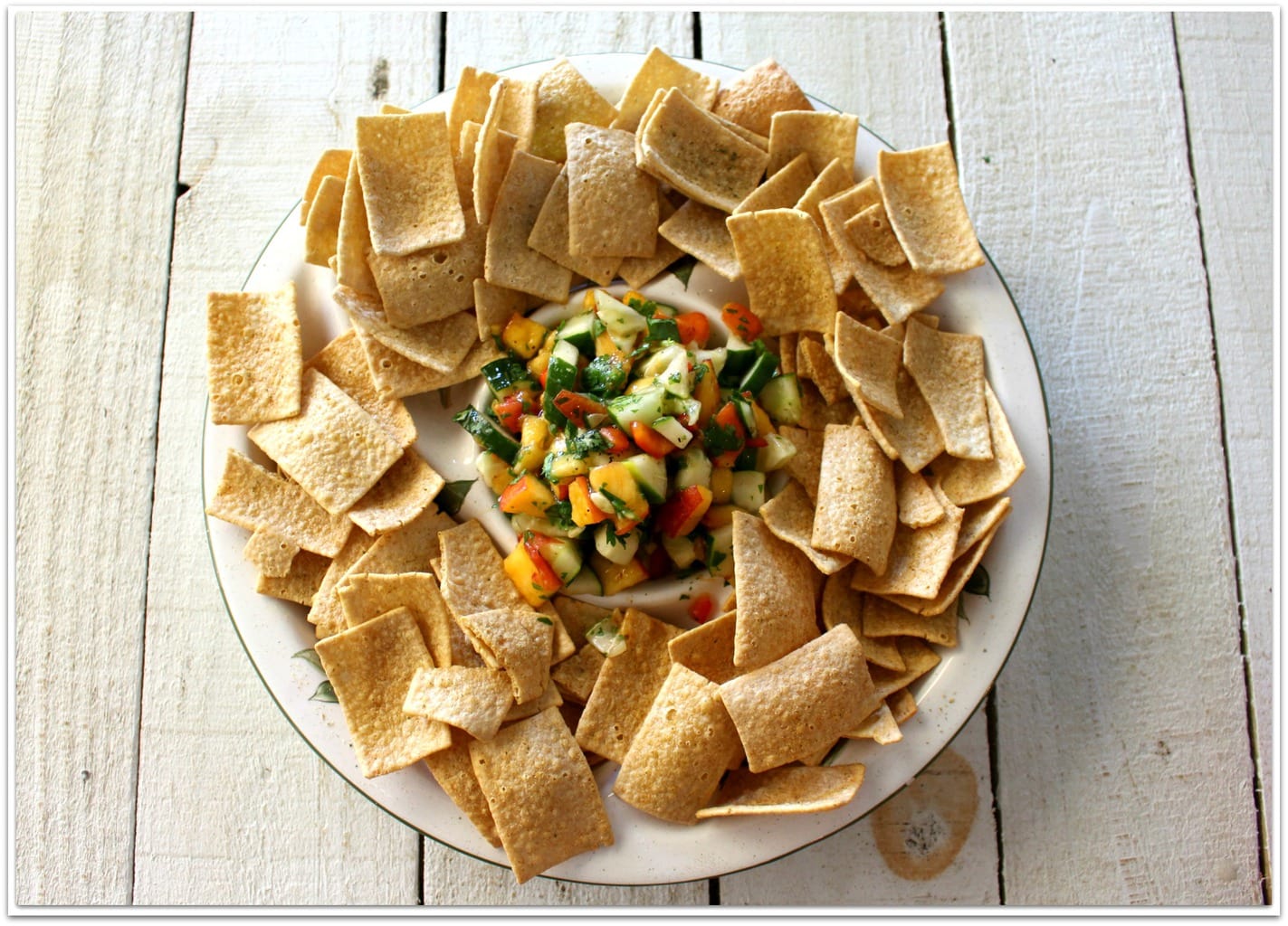 What could be better at a cookout or party than fresh peach and cucumber salsa? It doesn't matter what's on the table, I gravitate towards the chips and salsa. Any kind of salsa will do!