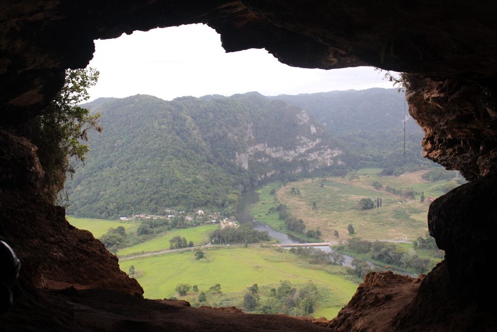 As soon as you step out of the darkness, you’ll be greeted with a spectacular view the Rio Grande de Areceibo valley, with the Caribbean sea in the far distance.