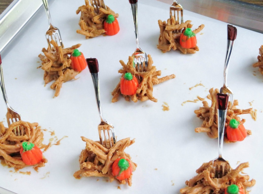 These adorable fall peanut butter haystacks are the perfect centerpiece for your Autumn or Halloween gathering, and the kids will love helping you make them. 