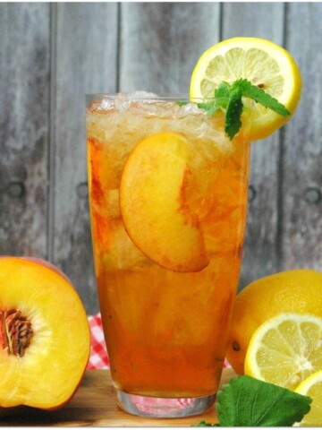 If you love an Arnold Palmer, you've got to try this Spiked Peach Arnold Palmer cocktail. Made with fresh peach, rum, vodka, sweet tea and lemonade, this cocktail screams summertime!