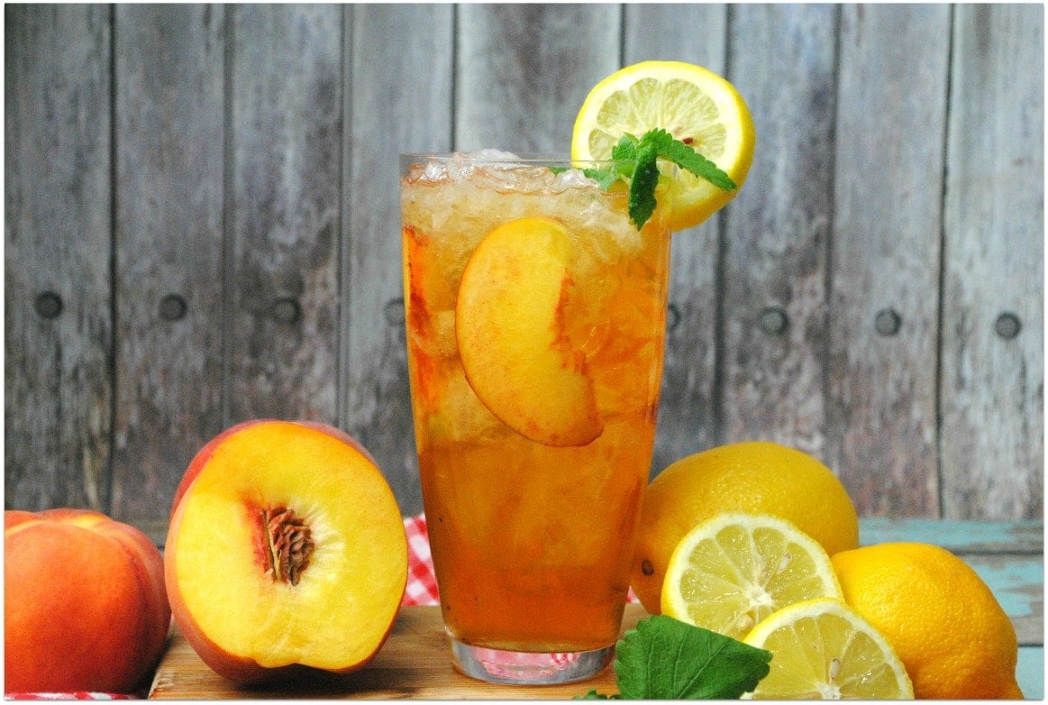 If you love an Arnold Palmer, you've got to try this Spiked Peach Arnold Palmer cocktail. Made with fresh peach, rum, vodka, sweet tea and lemonade, this cocktail screams summertime! 