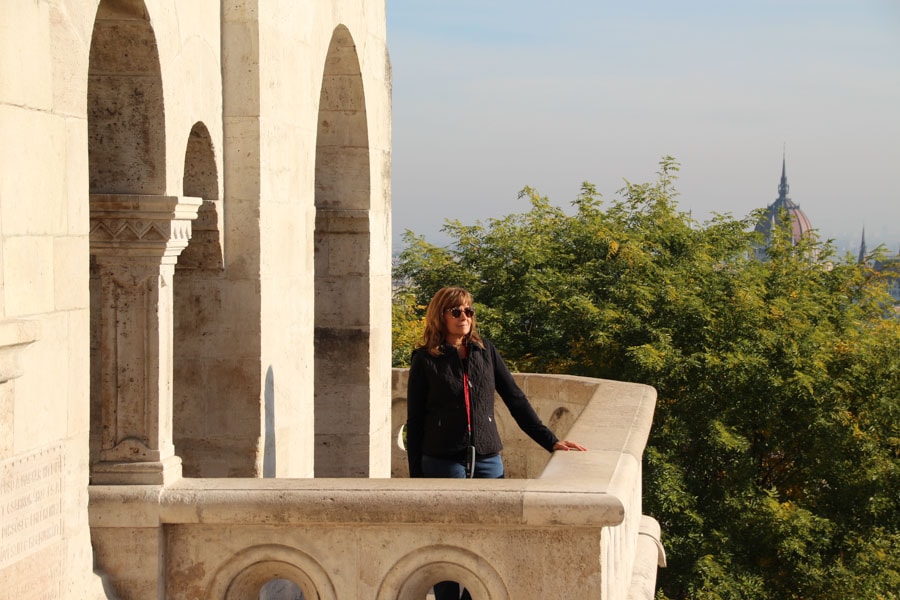 Woman on balcony at Fisherman's Bastian.