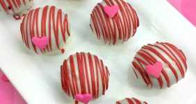 Looking for a boozy dessert for your next party? You are going to LOVE this one! Red velvet cake spiked with spiced bourbon whiskey will be the biggest hit at your party