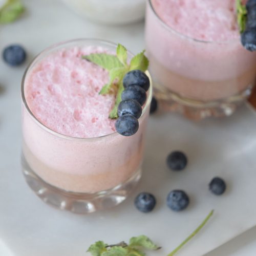 You are going to love the flavors in this Berry Mint Yogurt Smoothie. We're switching from eating high-sugar fruit yogurt to blending plain Greek yogurt with fresh fruit in a delicious and healthy smoothie.