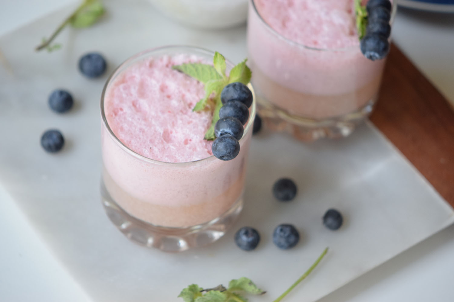 You are going to love the flavors in this Berry Mint Yogurt Smoothie. We're switching from eating high-sugar fruit yogurt to blending plain Greek yogurt with fresh fruit in a delicious and healthy smoothie.