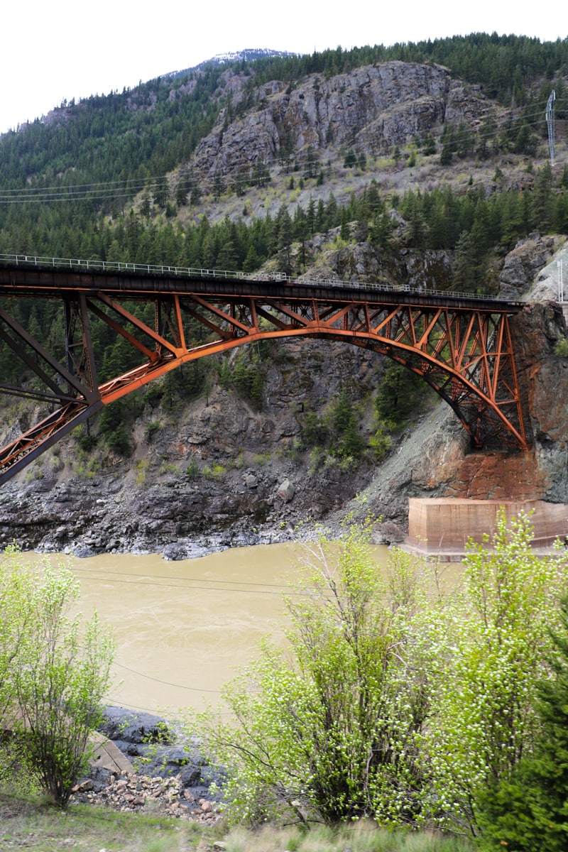 View of bridge over river on Rocky Mountaineer Train.