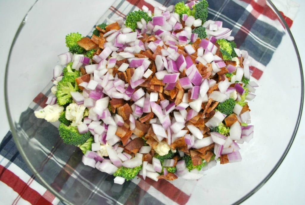 I don't know why I don't make this broccoli salad recipe more often. Whenever I'm at a party and there's a bowl of broccoli salad, I go back for seconds every time.