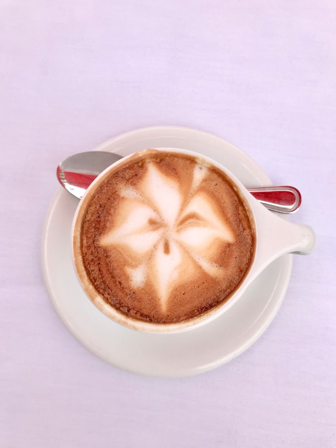 Cappuccino on a pink table.