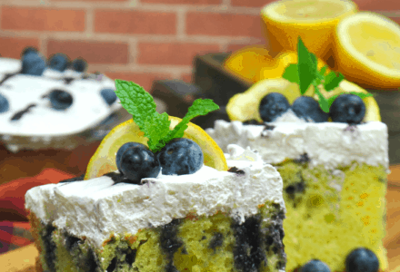 I'm not sure what it is about lemon poke cake with blueberries that just pairs so perfectly, but it truly is a match made in heaven. #LemonPokeCake #PokeCake #EasyCakeRecipe
