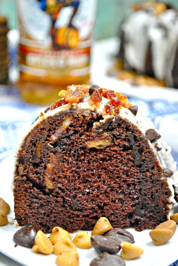 This decadent Chocolate Jamaican Rum Cake is so easy to make, the the rum gives it a kick and makes the texture so moist. Take this to a party and be a huge hit!