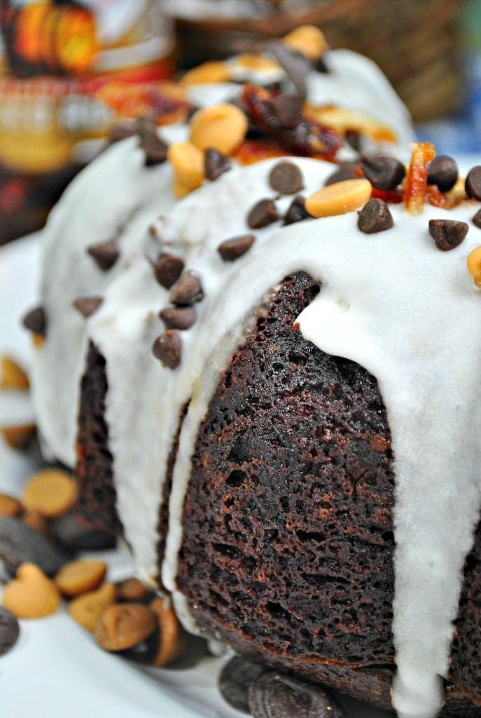 This decadent Chocolate Jamaican Rum Cake is so easy to make, the the rum gives it a kick and makes the texture so moist. Take this to a party and be a huge hit!