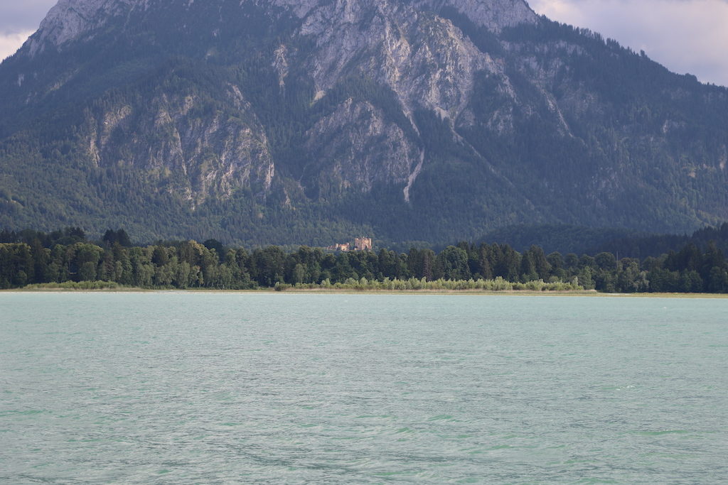 Lake with mountains in background.