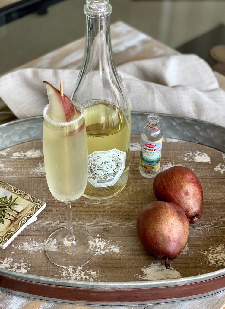 This pear martini recipe is for those of you who don't really like the taste of alcohol! Made with sparkling wine, muddled pear, and a pear liqueur, it's delightful!