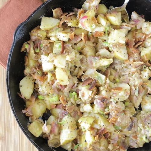 Potato salad in a skillet.