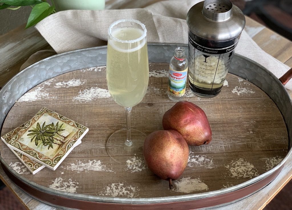 This pear martini recipe is for those of you who don't really like the taste of alcohol! Made with sparkling wine, muddled pear, and a pear liqueur, it's delightful!