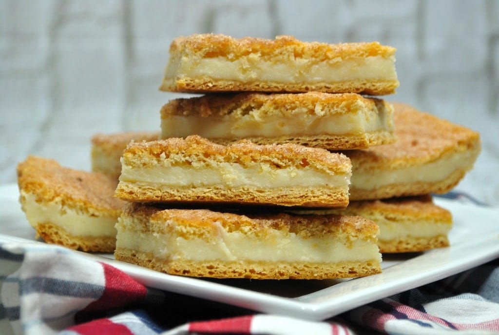 Churro bars filled with cheesecake.