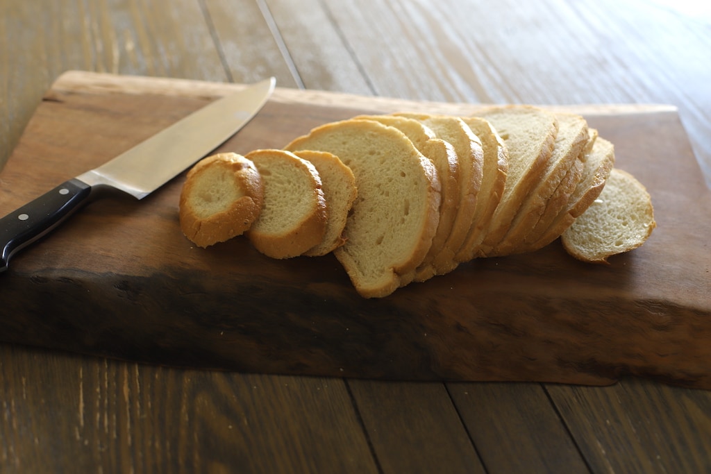 loaf of bread on cutting board