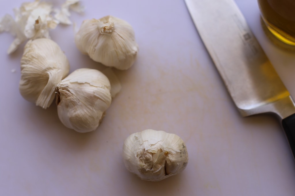 Knowing how to roast garlic cloves is important if you're planning to use roasted garlic in a dish or as a side with bread. Roasted garlic is creamy and delicious, and spreads like butter once it's roasted.