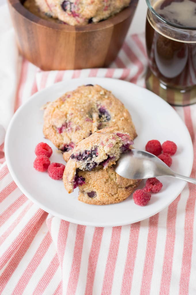 Scones on white plate on red and white striped tablecloth