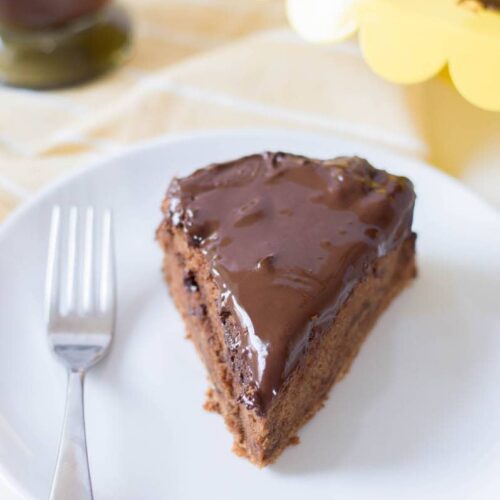 slice of chocolate cake on white plate