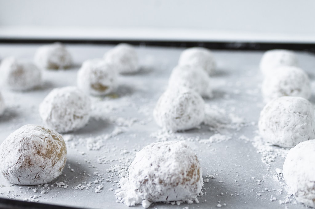 cookie dough balls covered with powdered sugar
