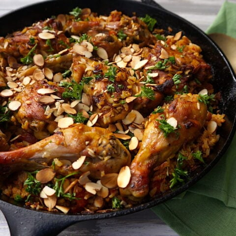chicken in cast iron skillet with rice
